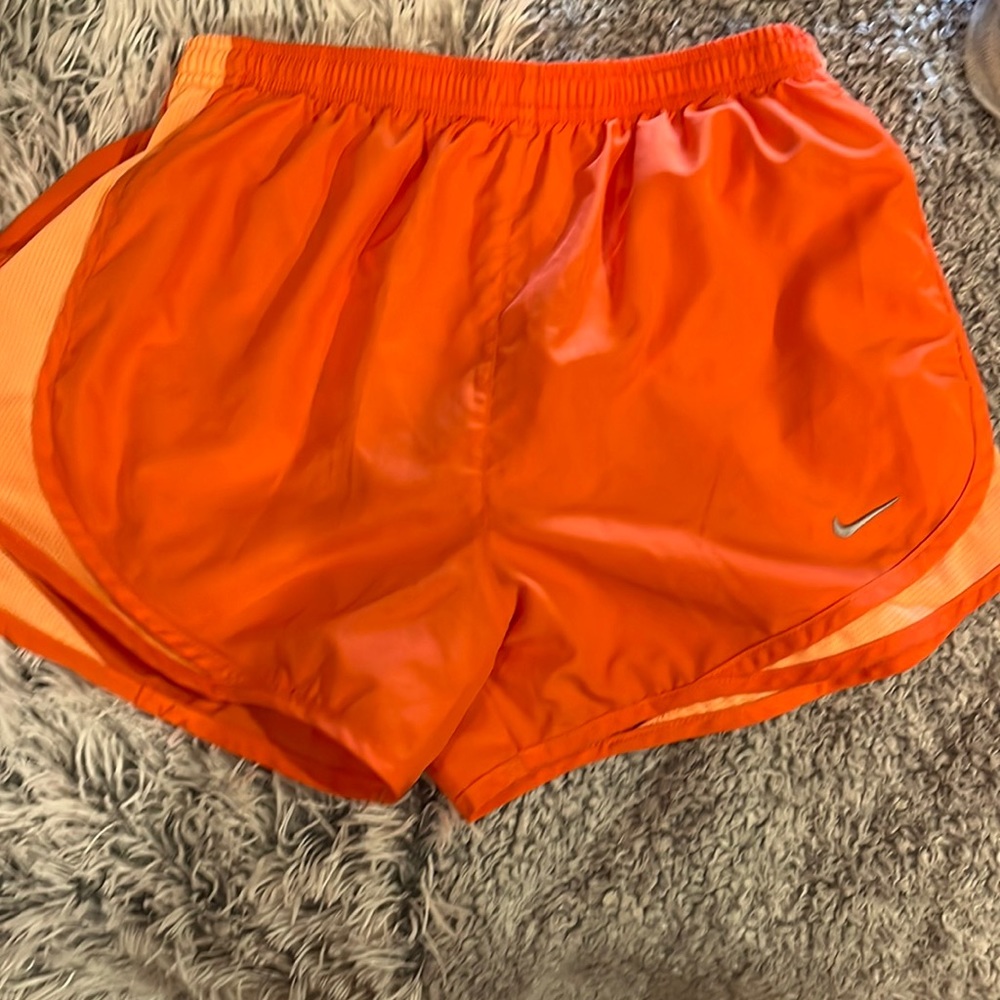 Orange Nike shorts